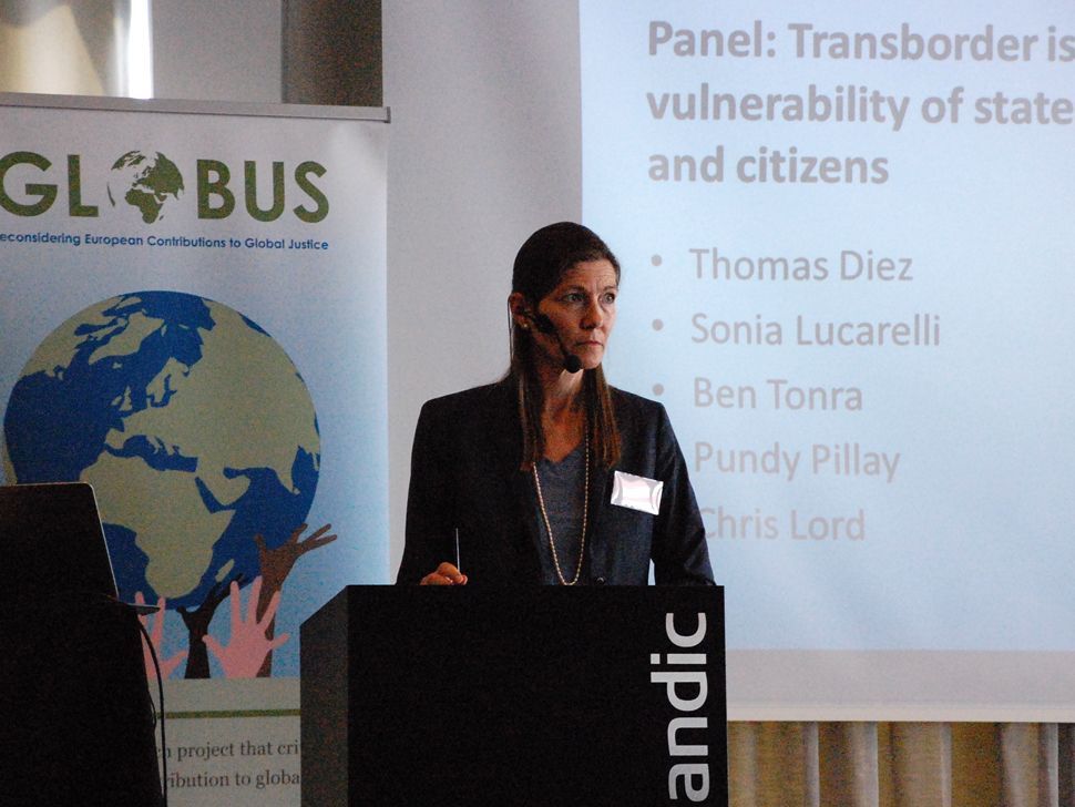 Helene Sjursen chairing the panel &#39;Transborder issues and the vulnerability of states and citizens&#39;.